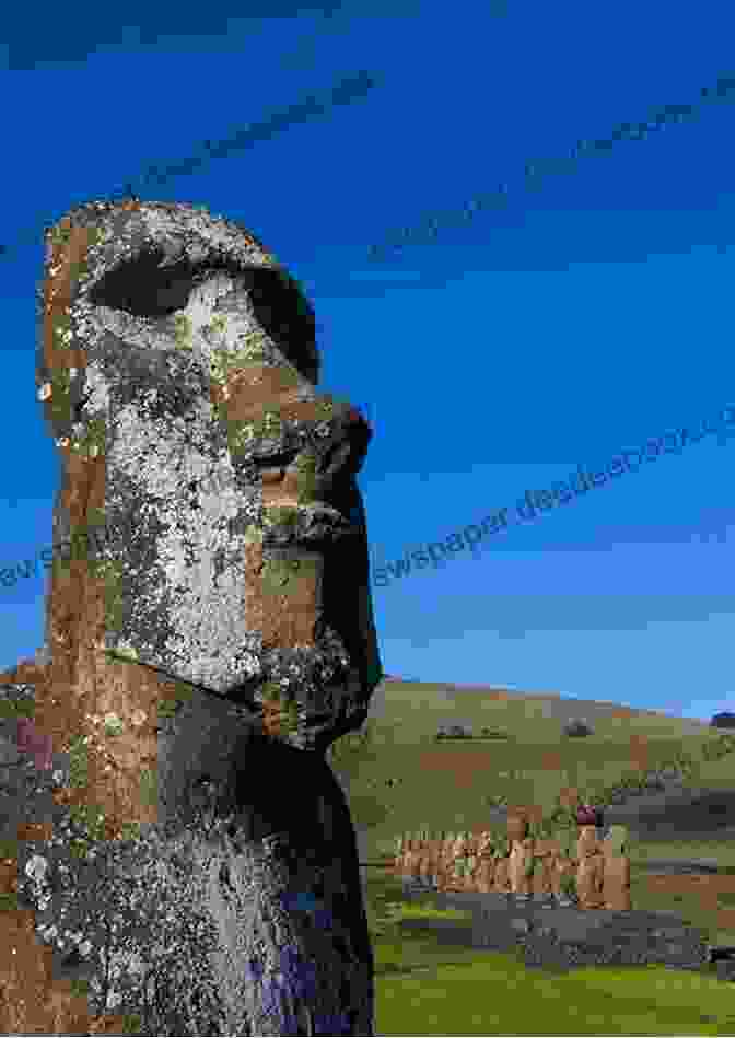 A Close Up Of A Monolithic Moai Statue, Its Stoic Gaze And Intricate Carvings Conveying A Sense Of Timeless Power And Grandeur. Photos Taken By Japanese Tourist In Easter Island